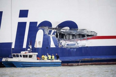 A hole on the side of Stena Line passenger ferry Stena Jutlandica is being inspected in the harbour of Gothenburg