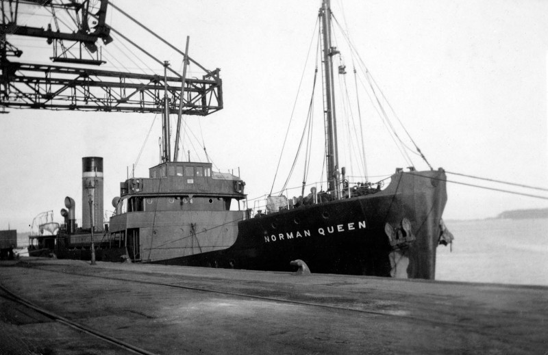 The 957grt Norman Queen of British Channel Islands Shipping unloading at Poole Gasworks on 25th May 1939. She was built in 1937 by Burntisland Shipbuilding. On 8th March 1941 she was off Cromer, part of the convoy FN-26, when she was attacked by the 3rd Flotilla of German Schnellboote (E-boats), consisting of S-101, S-28, S-27, S-29, S-31, S-61 and S-102. Six British cargo vessels were sunk. Eleven crew members of the Norman Queen lost their lives.