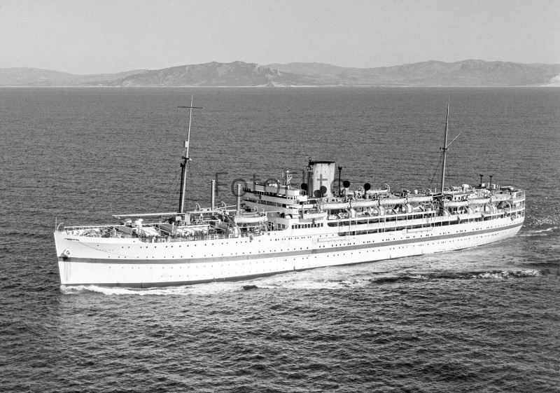 The Dunera with her familar broad blue band as a troopship. Photo: FotoFlite