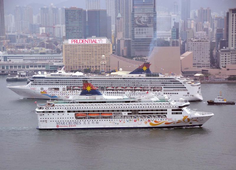 Passing ships in Hong Kong. In the foreground is the outward bound 40,053gt Star Pisces passing the 75,338gt inward bound Superstar Virgo. The Star Pisces was built in 1990 by Masa Yards at Turku as the car ferry Kalypso for Rederi AB Slite. In 1993 she was sold to Star Cruises for conversion into a cruise ship. She currently operates overnight gambling cruises out of Hong Kong. The Superstar Virgo was built in 1999 by Jos. L. Meyer at Papenburg and is the current flagship of the Star Cruises fleet. She will operate from Kaohsiung in 2017.